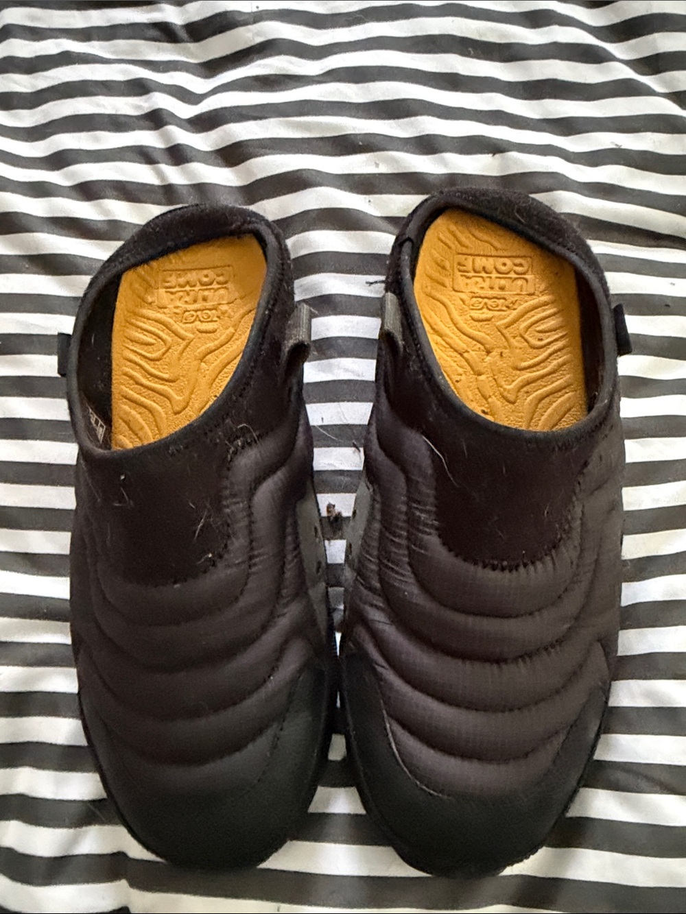 Teva Men's Black Quilted Slip-On Clogs with Tan Insole